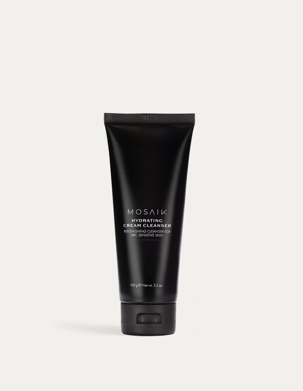 The Mosaik Hydrating Cream Cleanser is shown in a sleek black tube with minimalist white text on a light background. The design reflects a modern, refined aesthetic emphasizing simplicity and skincare efficacy.