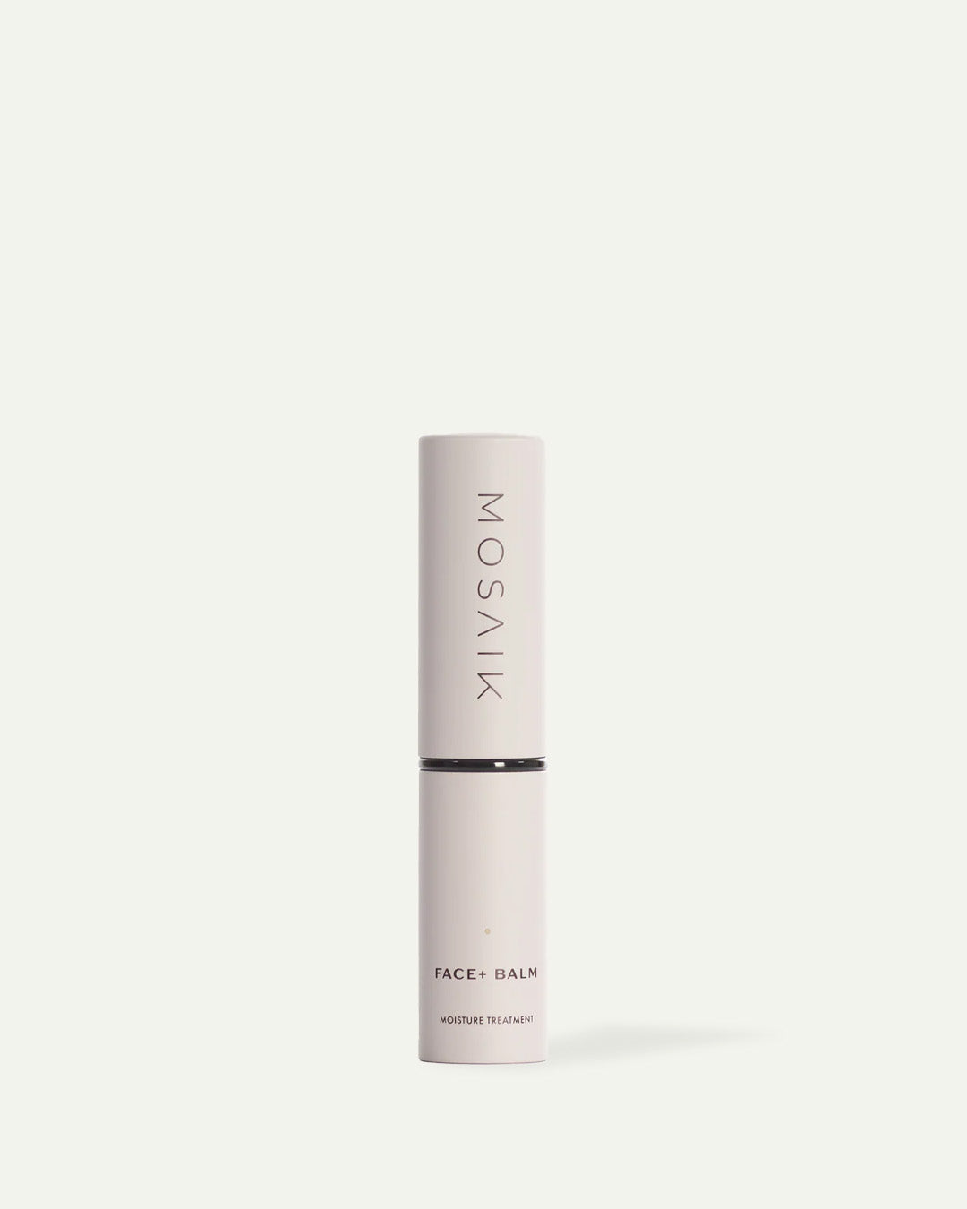 MOSAIK Face+ Balm moisture treatment in light beige cylindrical tube.