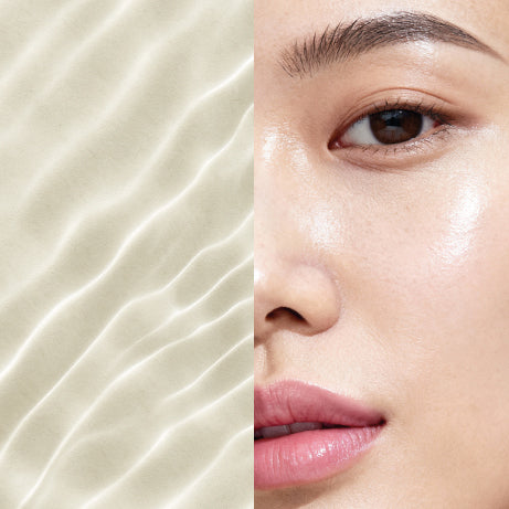 A split image showing a close-up of a person’s face with smooth, radiant skin on the right and soft sand-like texture on the left. The composition highlights hydration and a natural, healthy complexion.