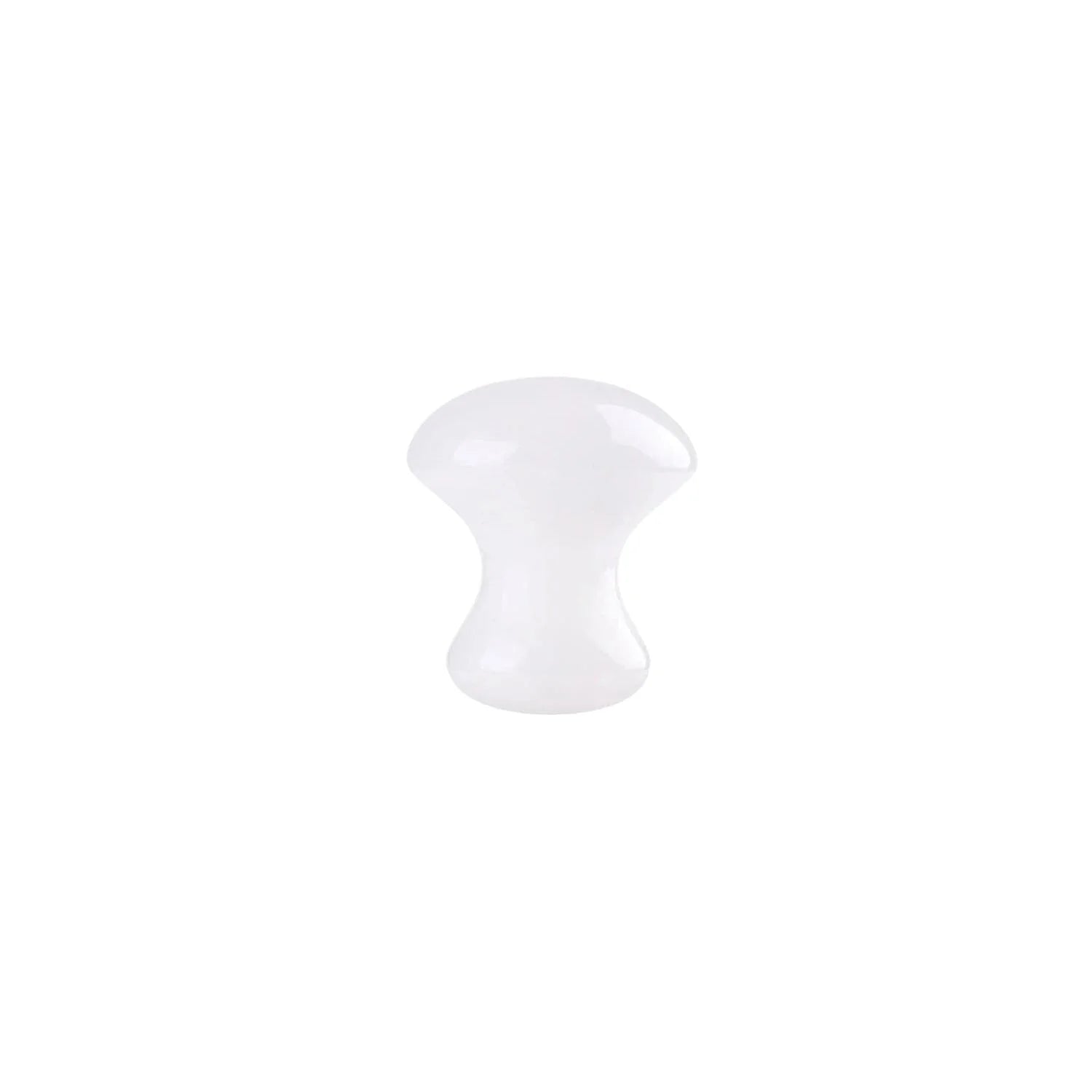 A white, mushroom-shaped facial massage tool made of smooth material, shown against a plain white background. The object has a rounded top and a narrow center for easy grip.
