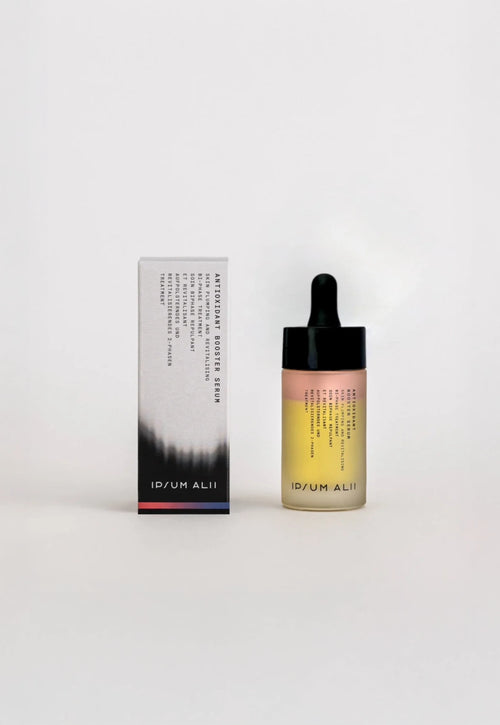 Ipsum Alii Antioxidant Booster Serum bottle and its matching minimalist packaging box displayed against a clean white background, showcasing the brand’s modern and refined skincare design.