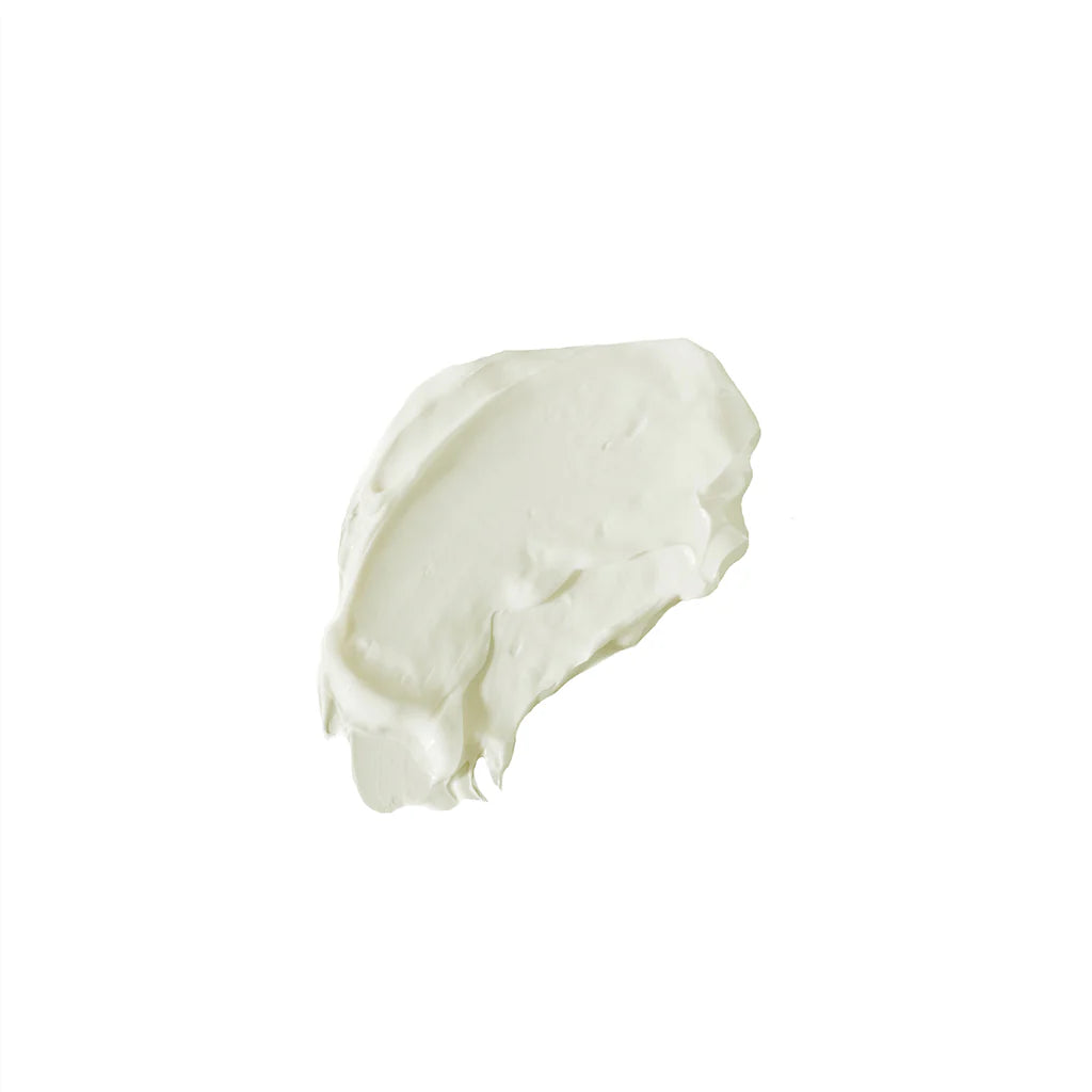 A close-up of a smooth, white cream texture on a plain background. The thick and velvety consistency suggests a rich, nourishing skincare product.