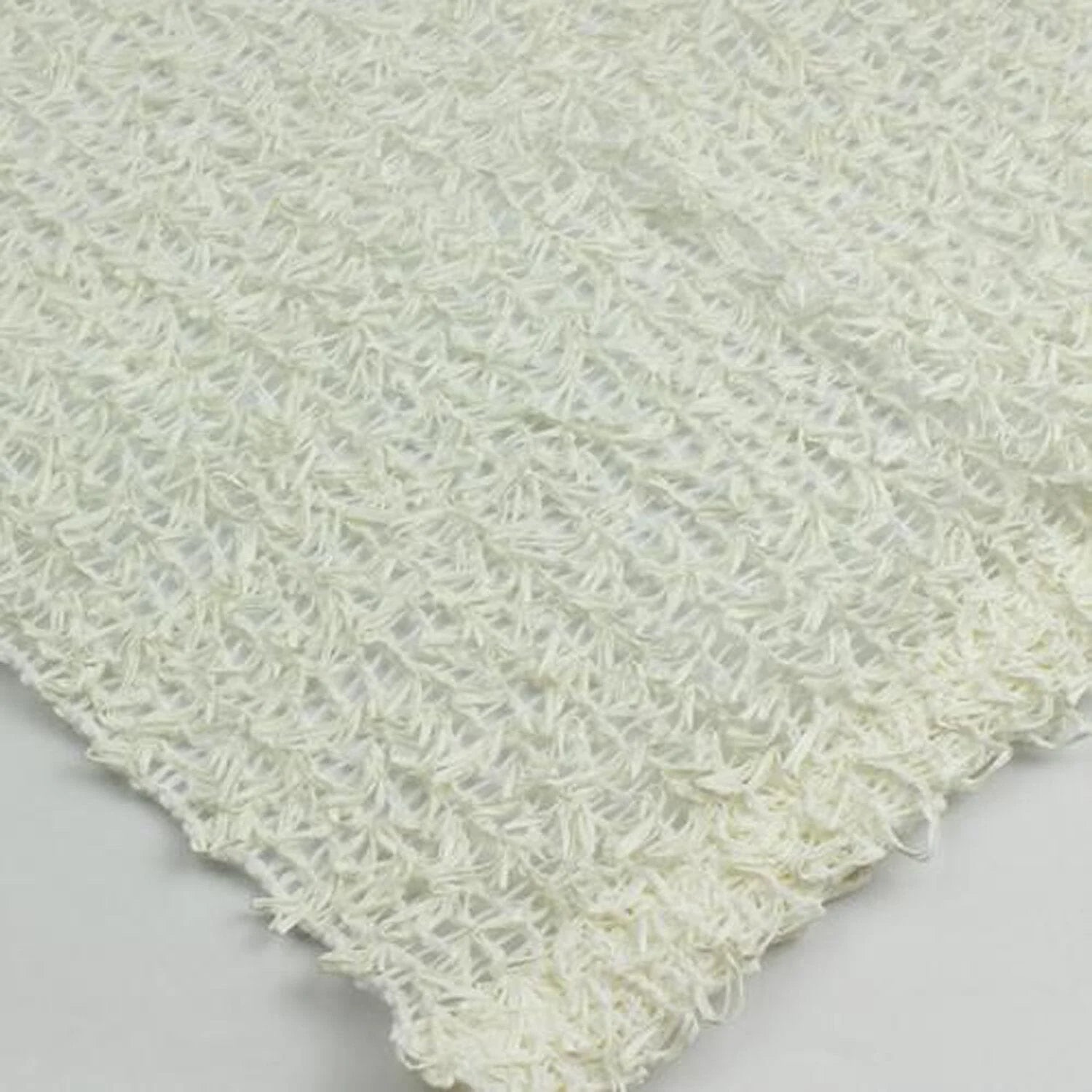 A close-up of a white woven mesh fabric with a soft, airy texture. The material has an open weave pattern made of thin, slightly glossy fibers.
