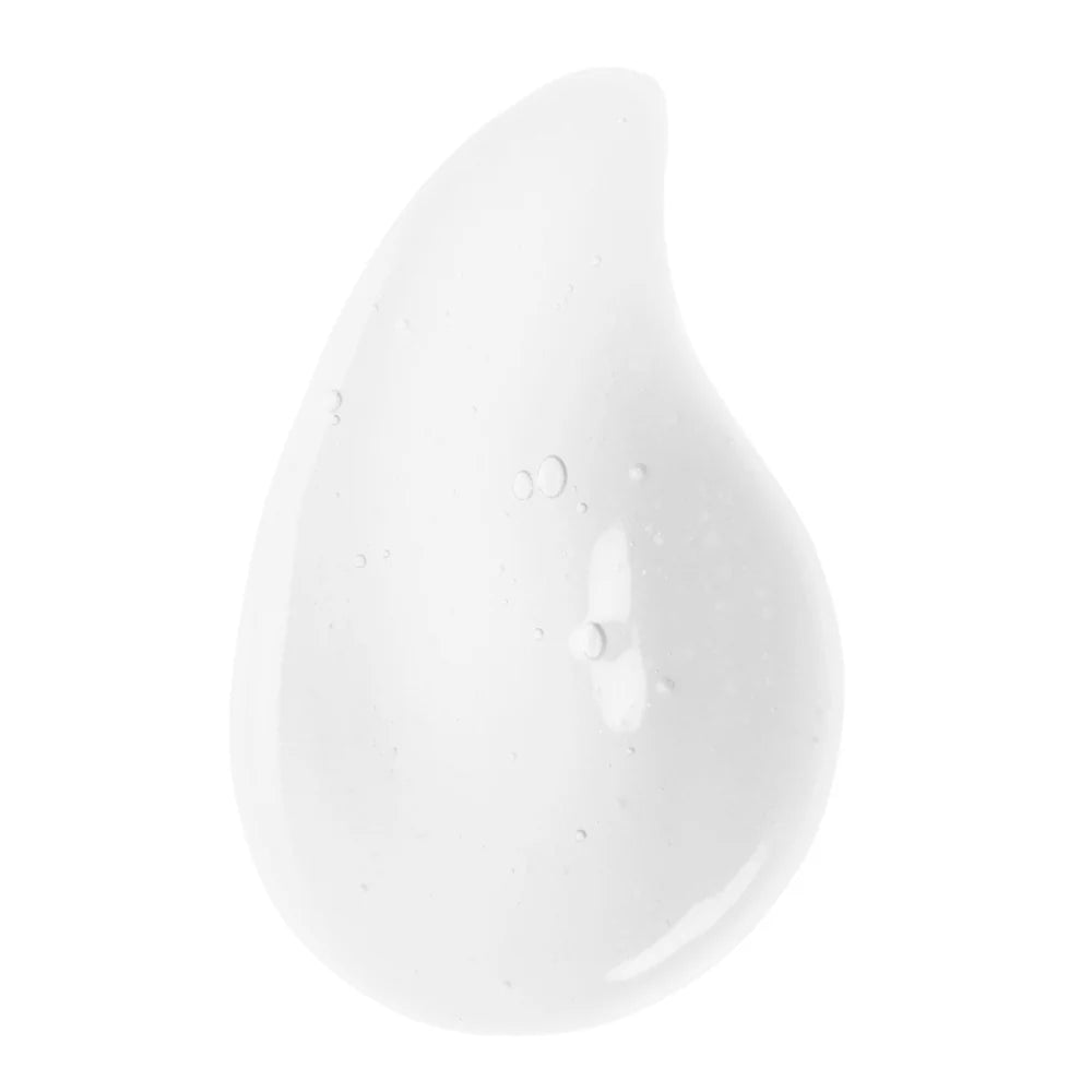 A close-up of a white gel-like skincare texture with small air bubbles visible inside. The smooth, glossy surface highlights the product’s lightweight and hydrating consistency.